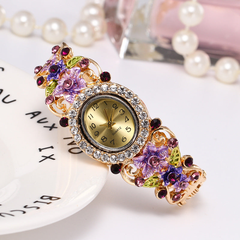 Flower-encrusted hollow watch