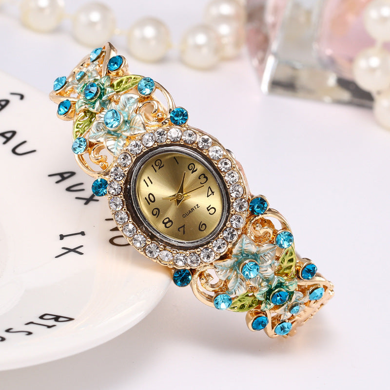 Flower-encrusted hollow watch