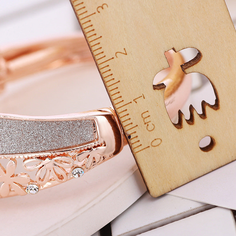 Rose gold flower ladies bracelet watch