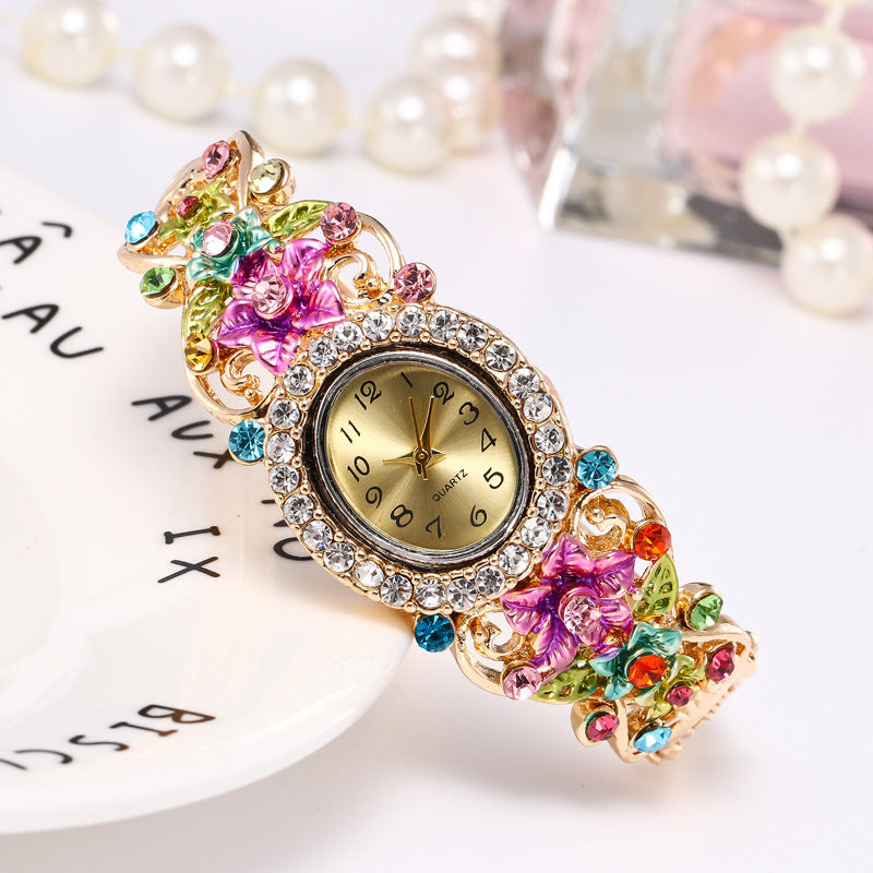 Flower-encrusted hollow watch
