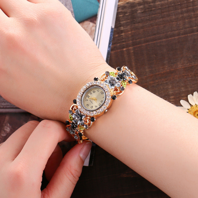 Flower-encrusted hollow watch