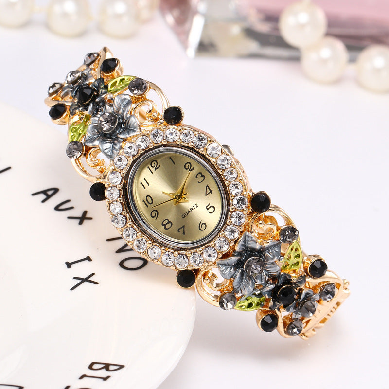 Flower-encrusted hollow watch